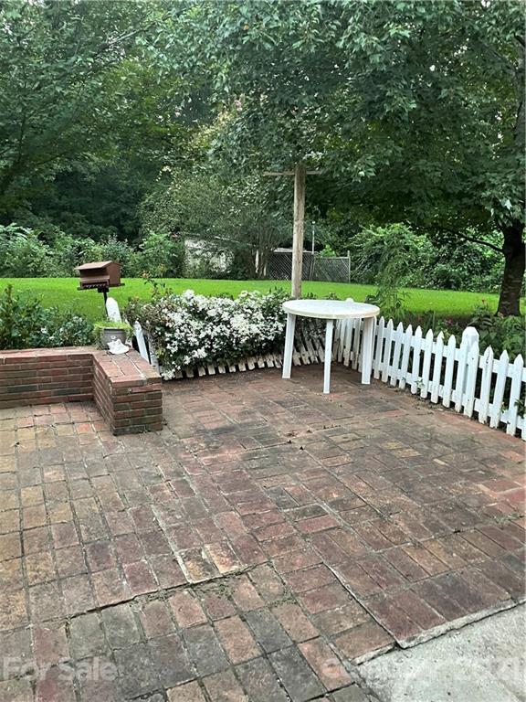 520 Neel Road Salisbury, NC 28147 - Photo 13 of 14 a view of a chairs and table in the back yard