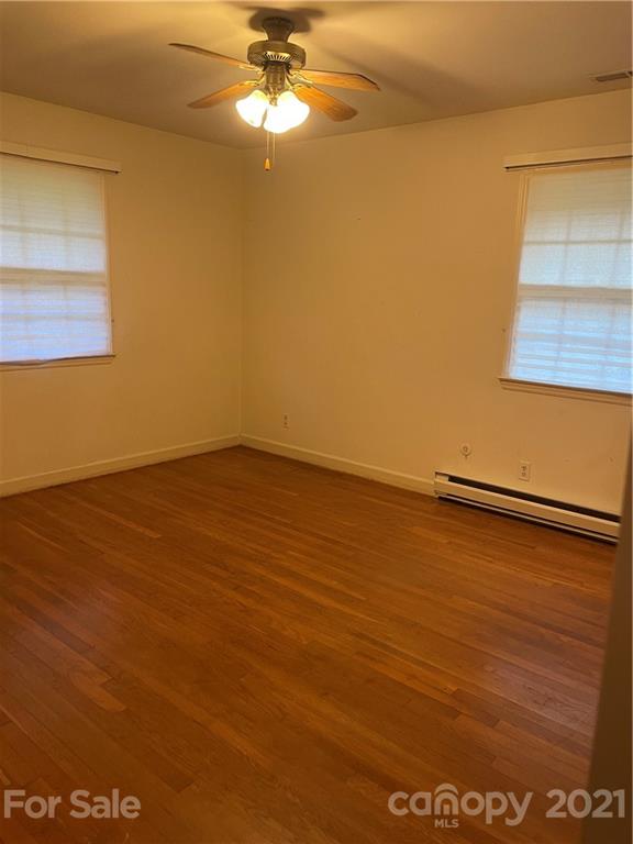 520 Neel Road Salisbury, NC 28147 - Photo 6 of 14 a view of an empty room with wooden floor