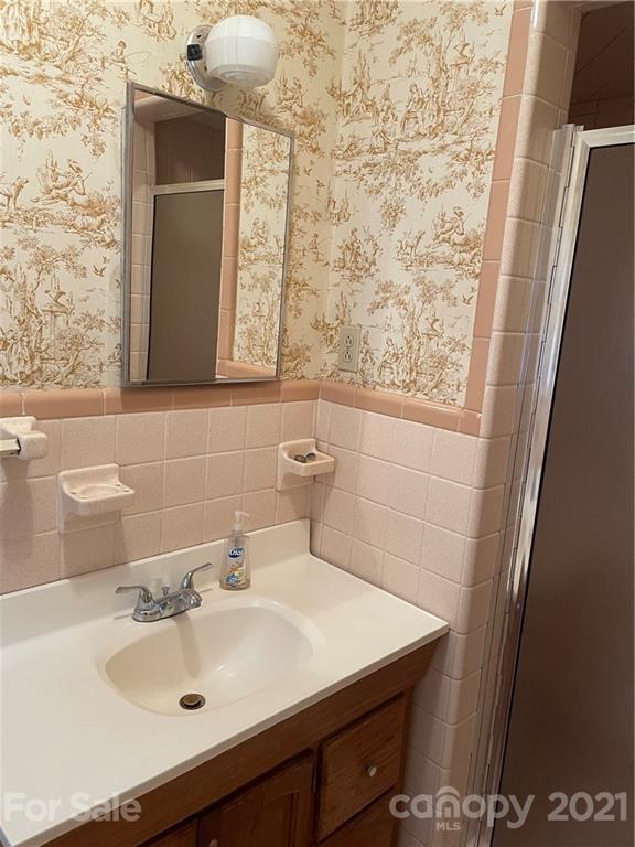 520 Neel Road Salisbury, NC 28147 - Photo 7 of 14 a bathroom with a sink and a mirror