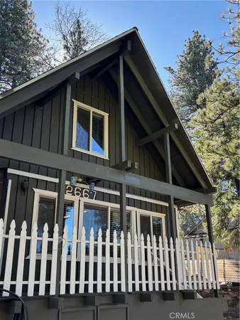 a front view of a house with balcony