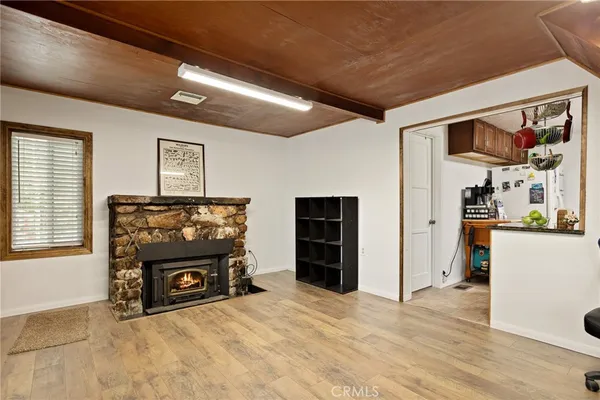 a view of livingroom with furniture and a flat screen tv