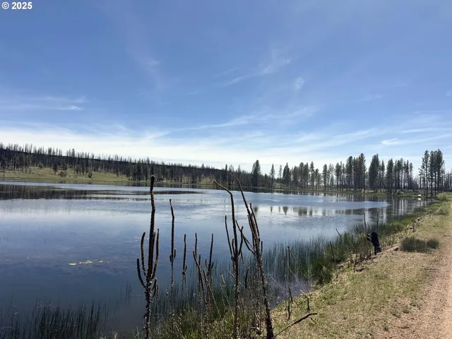 a view of a lake with outdoor space