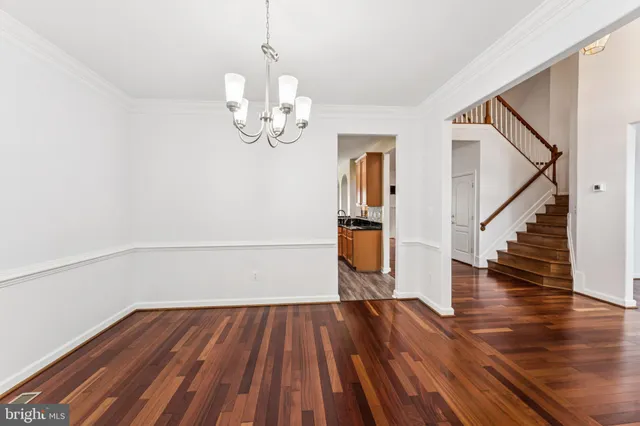 a spacious bathroom with a bathtub and a sink