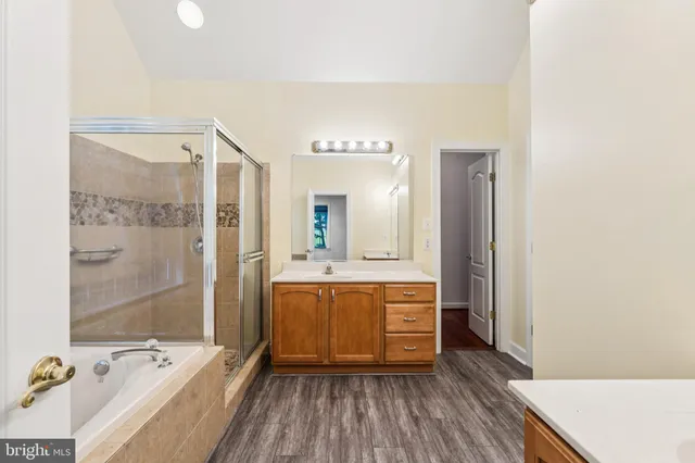 a view of a livingroom with wooden floor