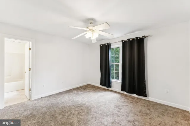 a bathroom with a sink double vanity and a mirror