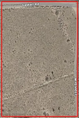 a close up of a white marble bathroom