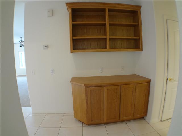18263 Chablis Road Ramona, CA 92065 - Photo 12 of 25 In the hall way is cabinets for storage and display. Next to the storage cabinets is a large linen closet which stores the electronic wiring for the house.