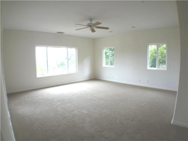 18263 Chablis Road Ramona, CA 92065 - Photo 18 of 25 Open and bright spacious master bedroom. Place your bed between the two windows and wake up to the panoramic views of the Ramona Valley.
