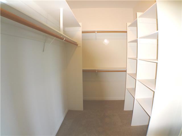 18263 Chablis Road Ramona, CA 92065 - Photo 21 of 25 Spacious Master Bedroom walkin closet with plenty of built ins. Ready for you to fill.