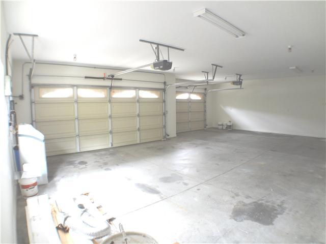 18263 Chablis Road Ramona, CA 92065 - Photo 22 of 25 Large three car garage with automatci rolling doors. Water softener is located in ghe garage.
