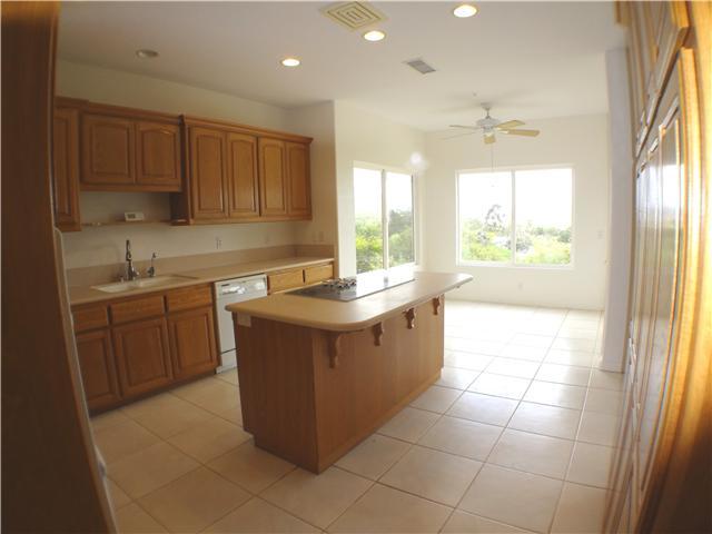 18263 Chablis Road Ramona, CA 92065 - Photo 7 of 25 Meander down the hall and enter into the large kitchen with island and breakfast nook.