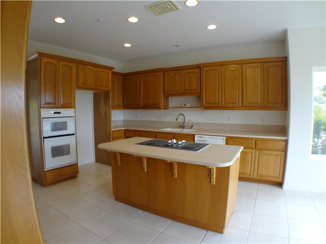 18263 Chablis Road Ramona, CA 92065 - Photo 8 of 25 Spacious kitchen for entertaining. Plenty of storage. Enjoy cooking at the island while enjoying the view of the Ramona Valley.