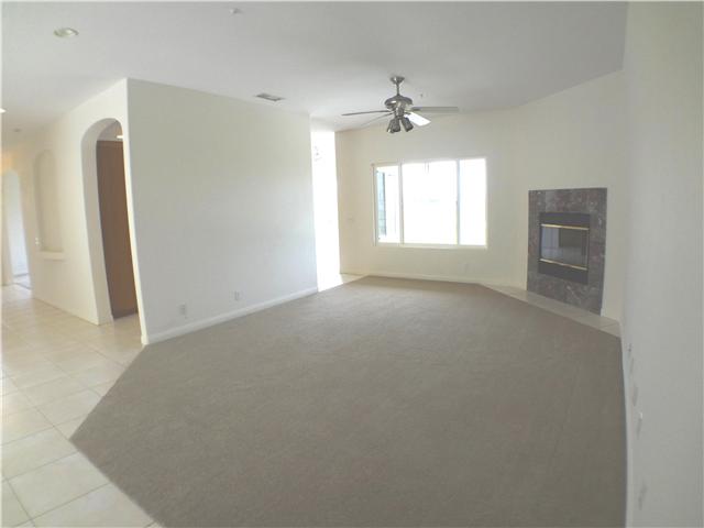 18263 Chablis Road Ramona, CA 92065 - Photo 10 of 25 Located in the center of the house is the family room. The spacious room includes a fireplace, ceiling fan, view and easy access to the kitchen and adjacent dining room.