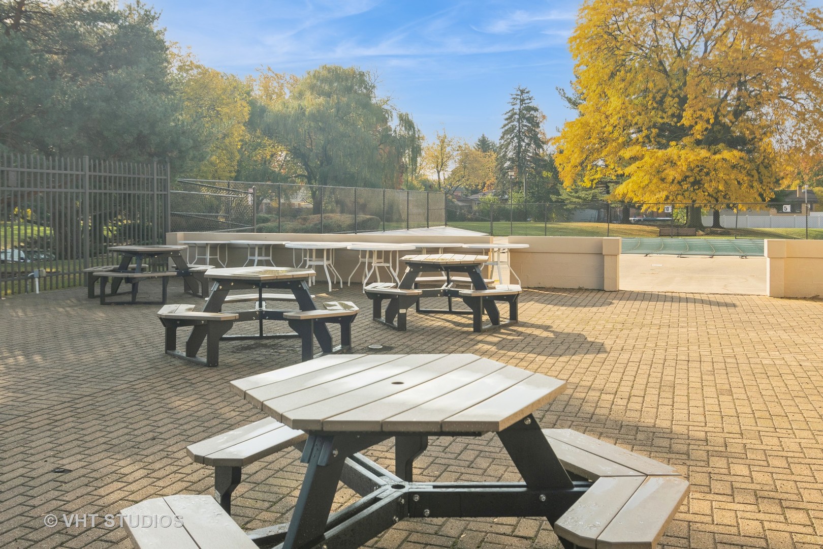 1505 East Central Road, Unit 111B Arlington Heights, IL 60005 - Photo 9 of 10 a view of backyard with seating area and barbeque oven