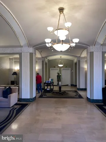 a view of a lobby with a chandelier