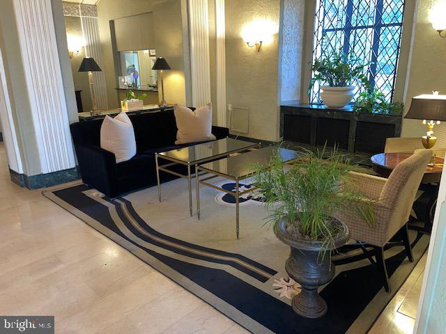 2040-2040 Belmont Road Northwest, Unit 423 Washington, DC 20009 - Photo 3 of 18 a dining room with furniture and wooden floor