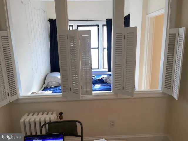 a view of front door and bedroom