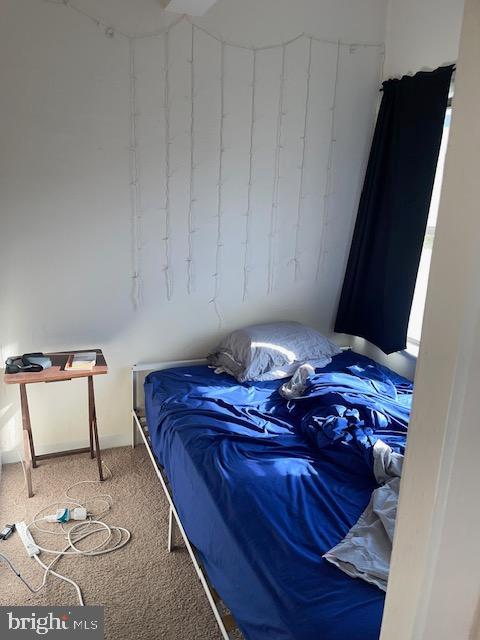 2040-2040 Belmont Road Northwest, Unit 423 Washington, DC 20009 - Photo 9 of 18 a bedroom with a bed and a window