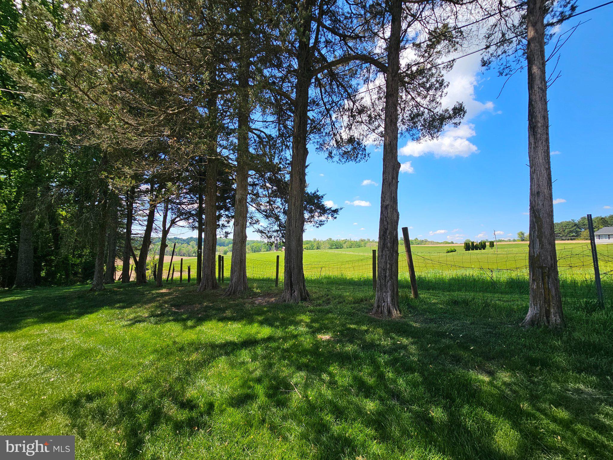 4619 Long Green Road Glen Arm, MD 21057 - Photo 15 of 74 Serene landscape under blue skies.