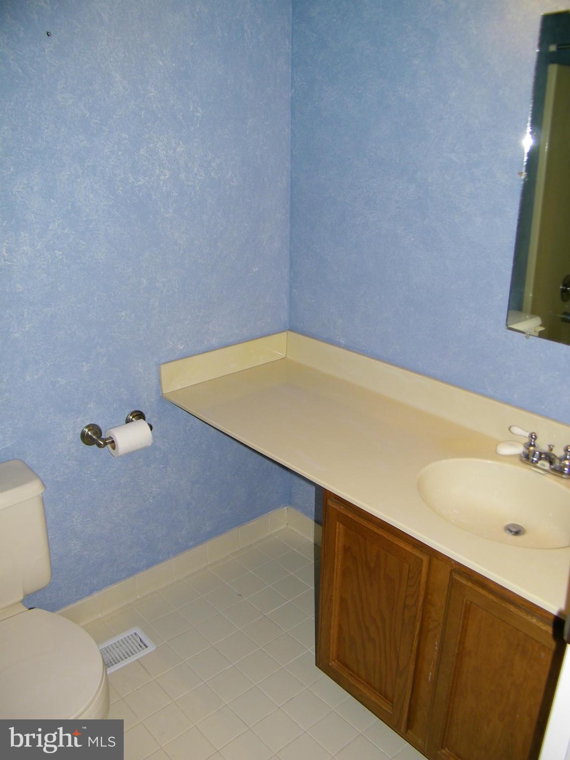 822 Dividing Road Severna Park, MD 21146 - Photo 19 of 30 Full bath in hallway on upper level