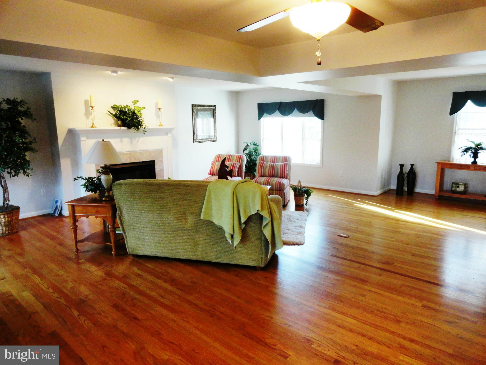 822 Dividing Road Severna Park, MD 21146 - Photo 4 of 30 Great room opens to the kitchen and screened porch