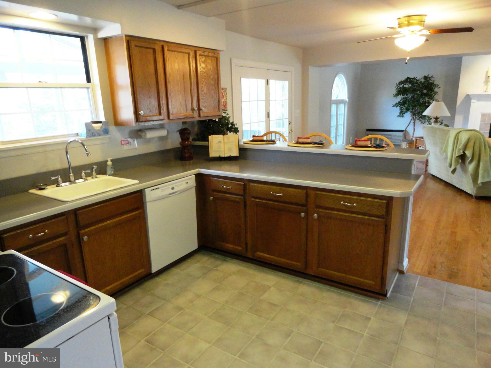822 Dividing Road Severna Park, MD 21146 - Photo 7 of 30 French Doors off Kitchen lead to the porch