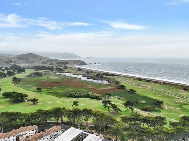 a backyard of a house with a garden