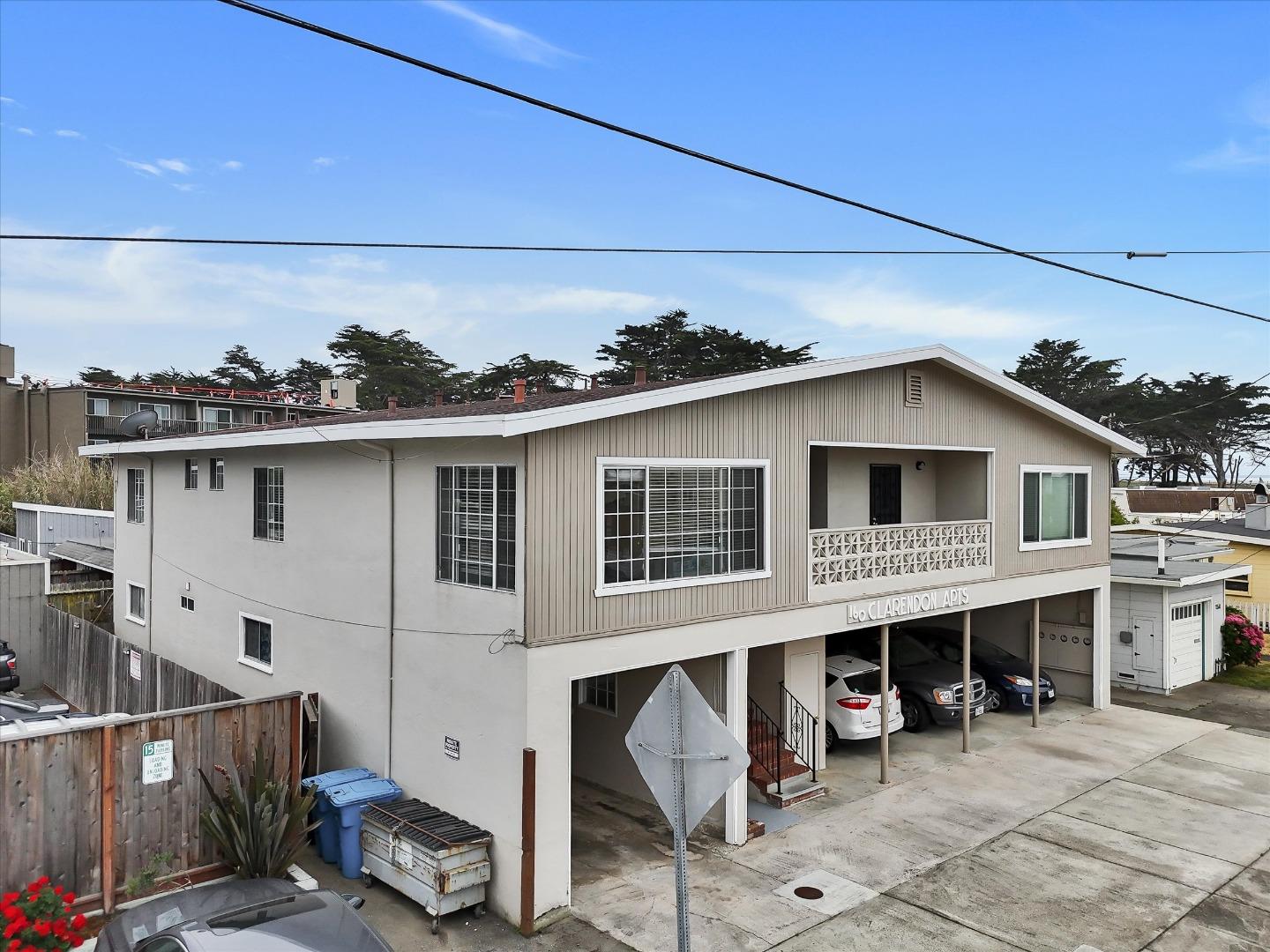 160 Clarendon Road Pacifica, CA 94044 - Photo 7 of 81 a view of a house with a patio and a yard