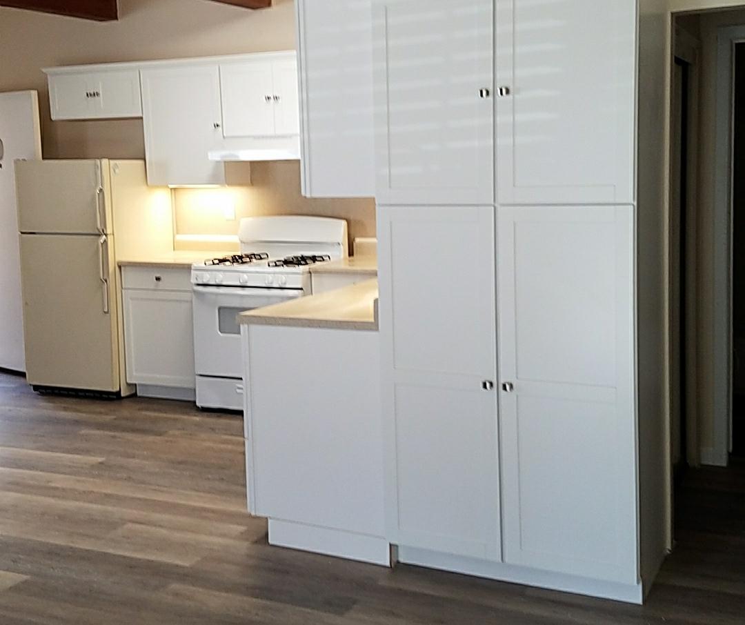 160 Clarendon Road Pacifica, CA 94044 - Photo 74 of 81 a kitchen with a refrigerator and a stove