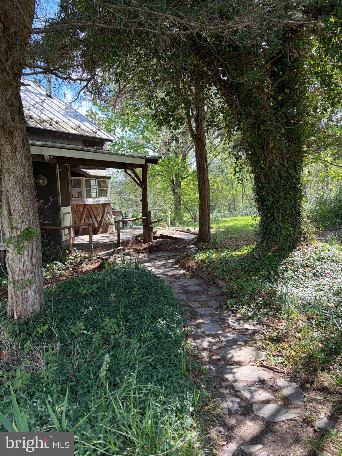 986 Rushing River Road Augusta, WV 26704 - Photo 7 of 56 Charming path to a rustic retreat.