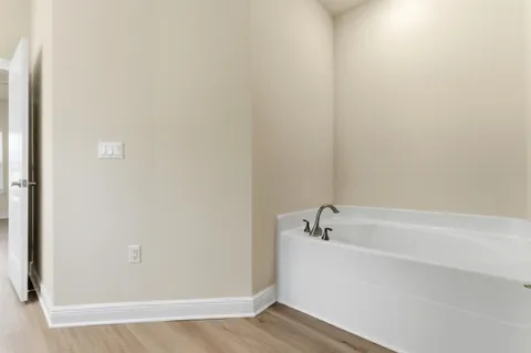 a view of a bathtub in a bathroom