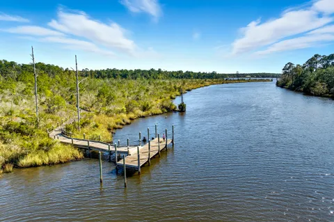 a view of a lake from a yard