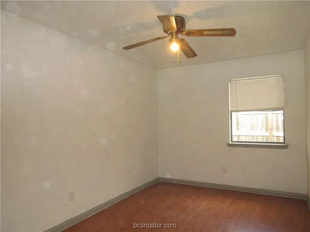 an empty room with a chair