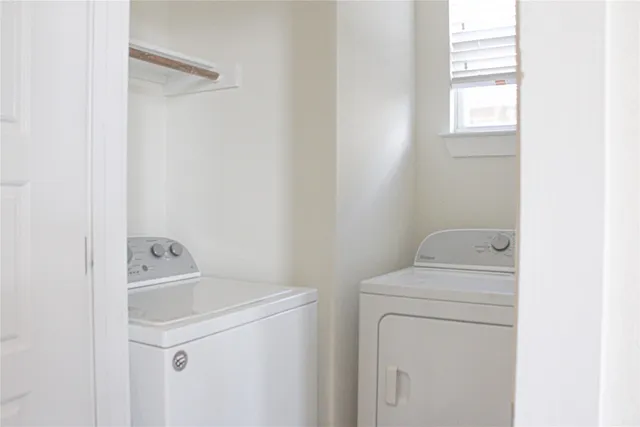 a view of a patio with couches and potted plants