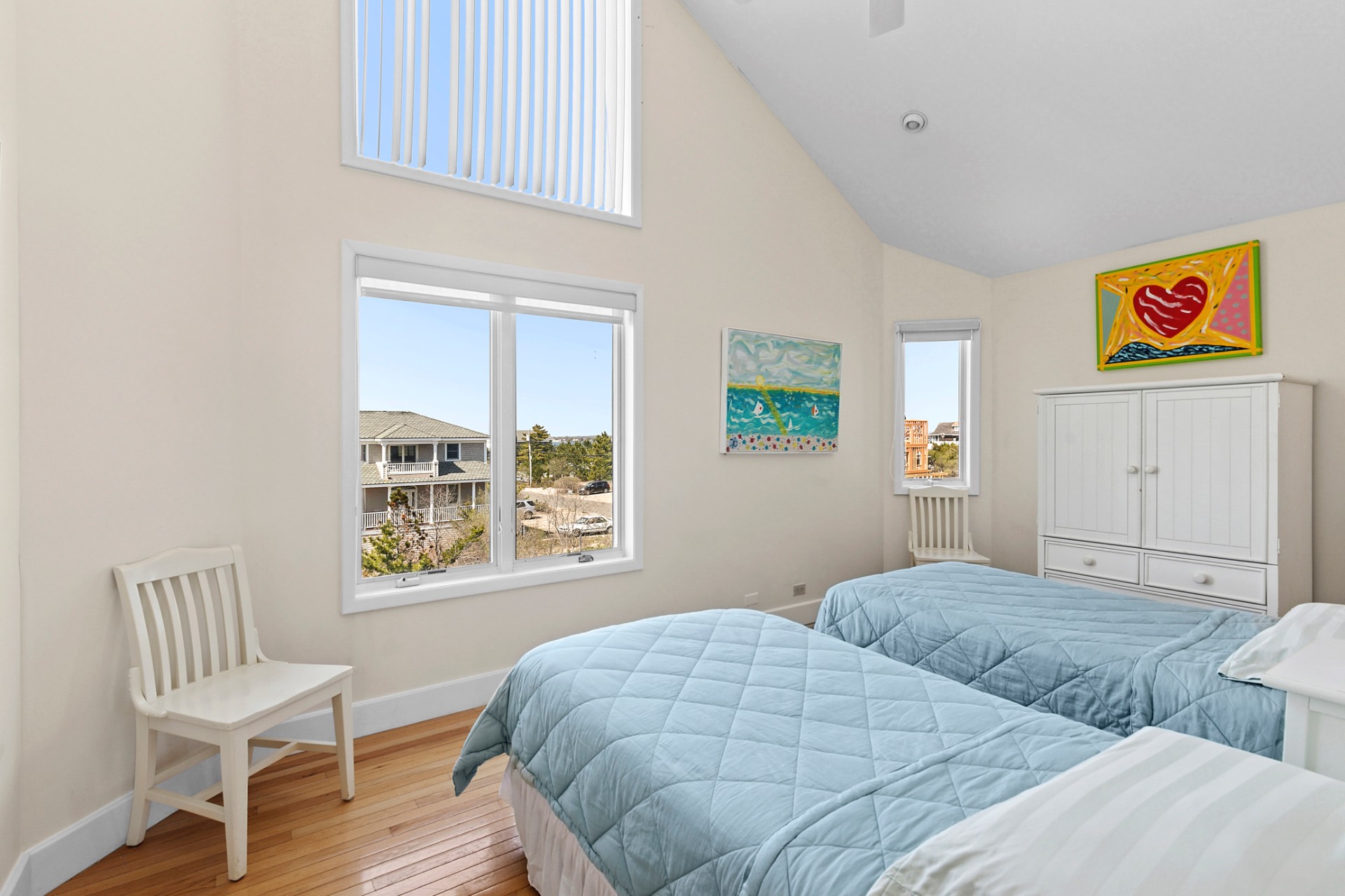 819 Dune Road Westhampton Beach, NY 11978 - Photo 12 of 18 a bedroom with two beds and a window