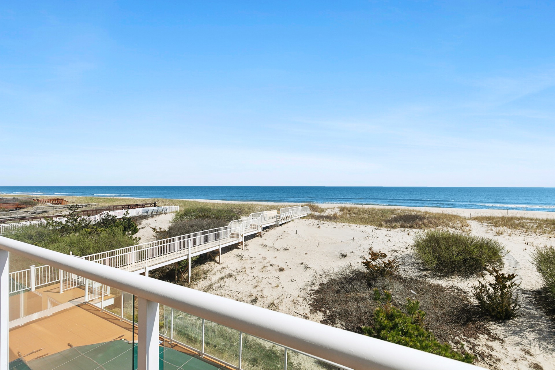 819 Dune Road Westhampton Beach, NY 11978 - Photo 13 of 18 a view of ocean from a balcony