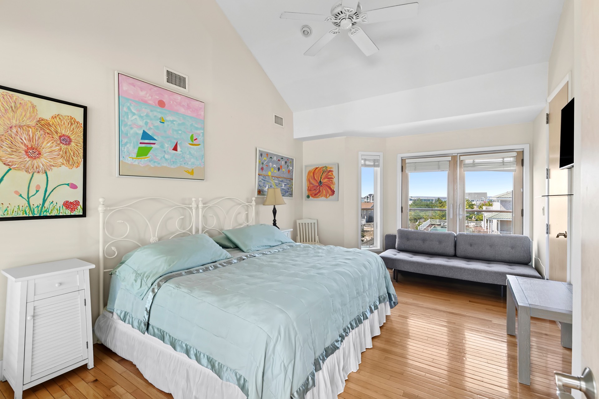 819 Dune Road Westhampton Beach, NY 11978 - Photo 15 of 18 a bedroom with a bed and a couch