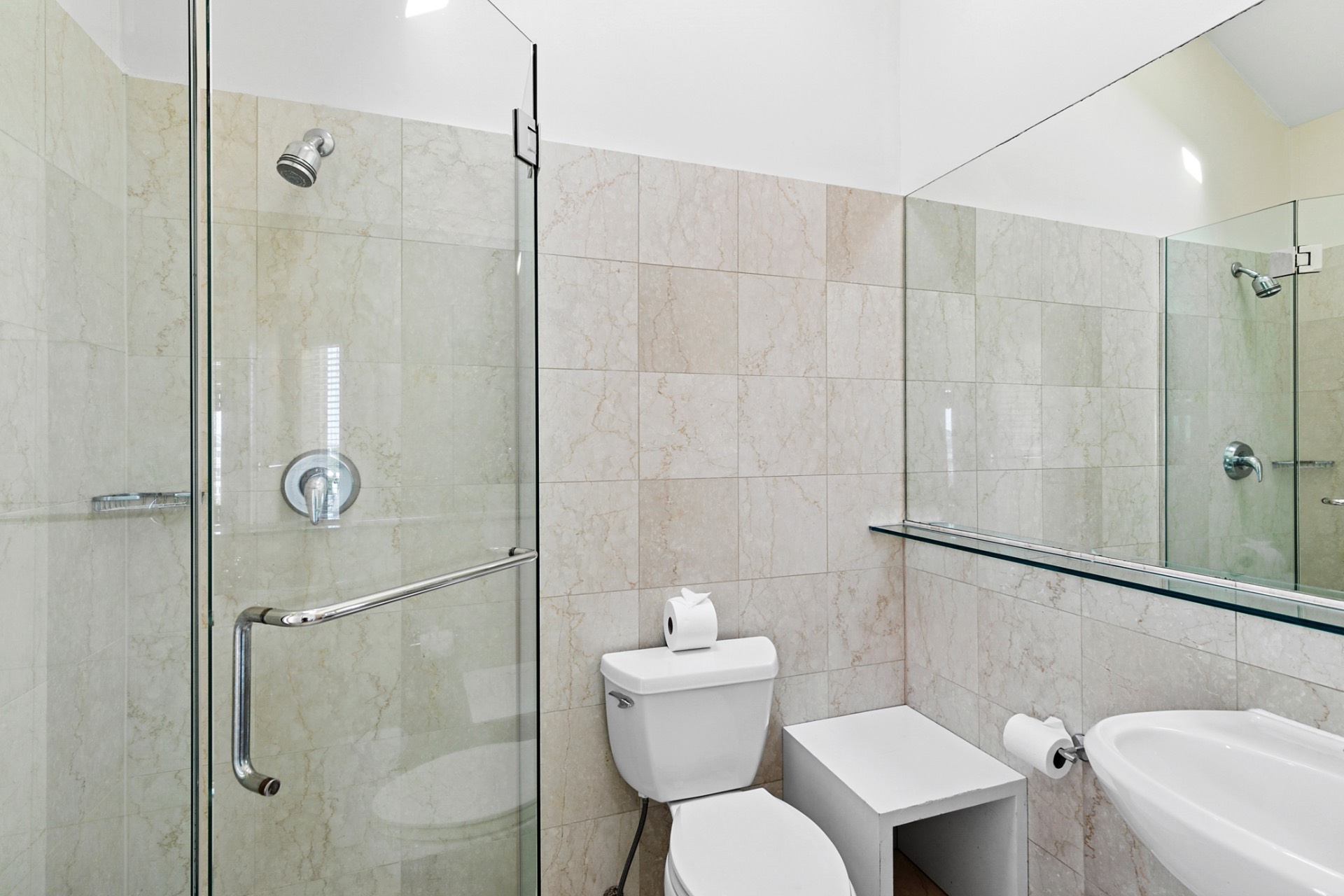 819 Dune Road Westhampton Beach, NY 11978 - Photo 16 of 18 a bathroom with a sink toilet and shower