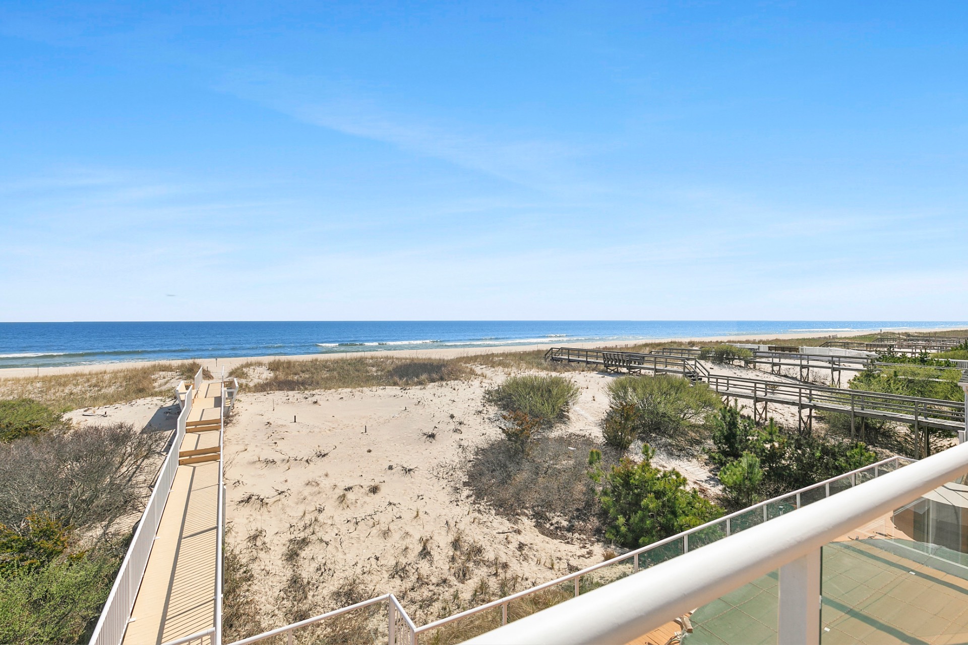 819 Dune Road Westhampton Beach, NY 11978 - Photo 2 of 18 a view of ocean from a balcony