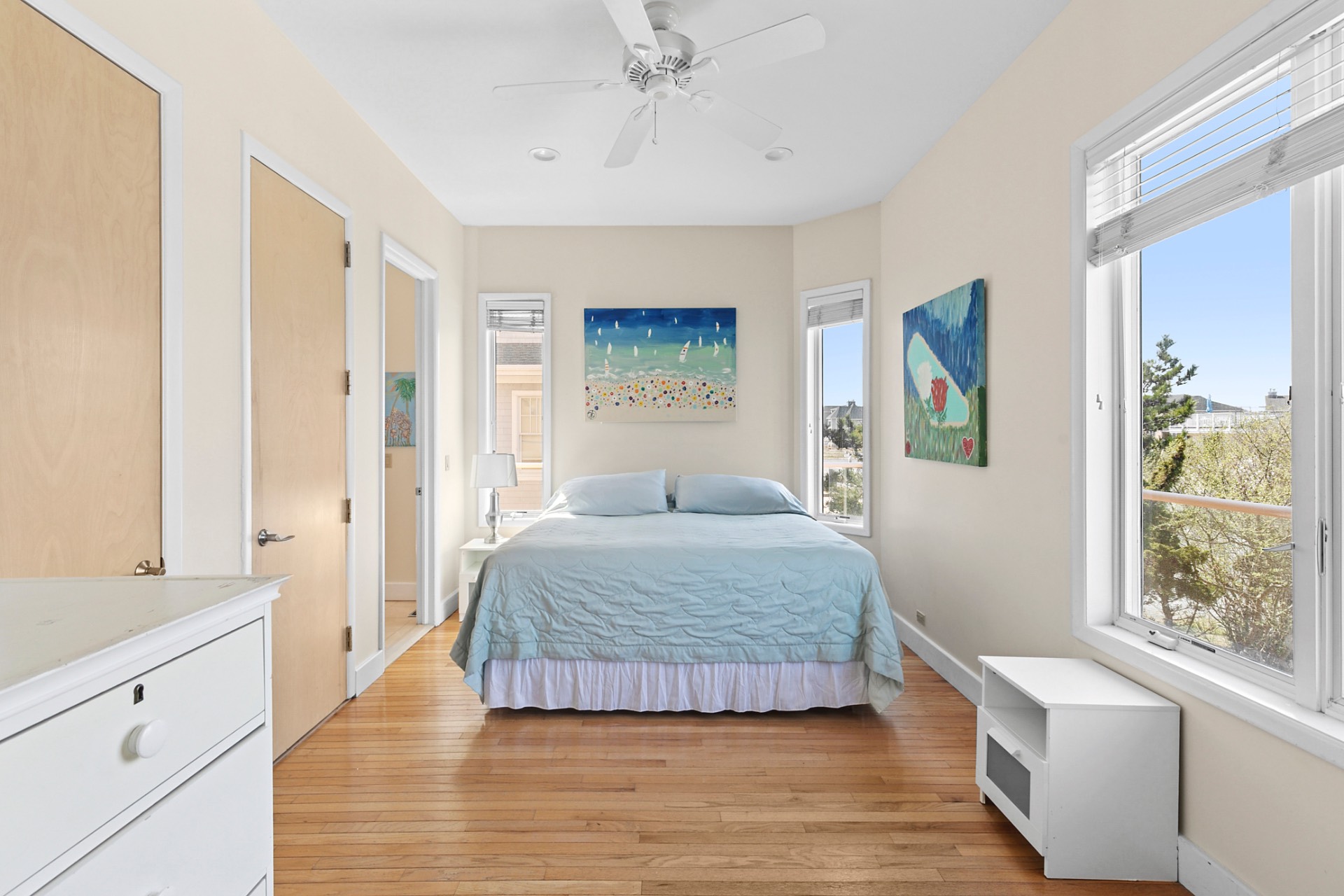 819 Dune Road Westhampton Beach, NY 11978 - Photo 8 of 18 a bedroom with a bed and a large window
