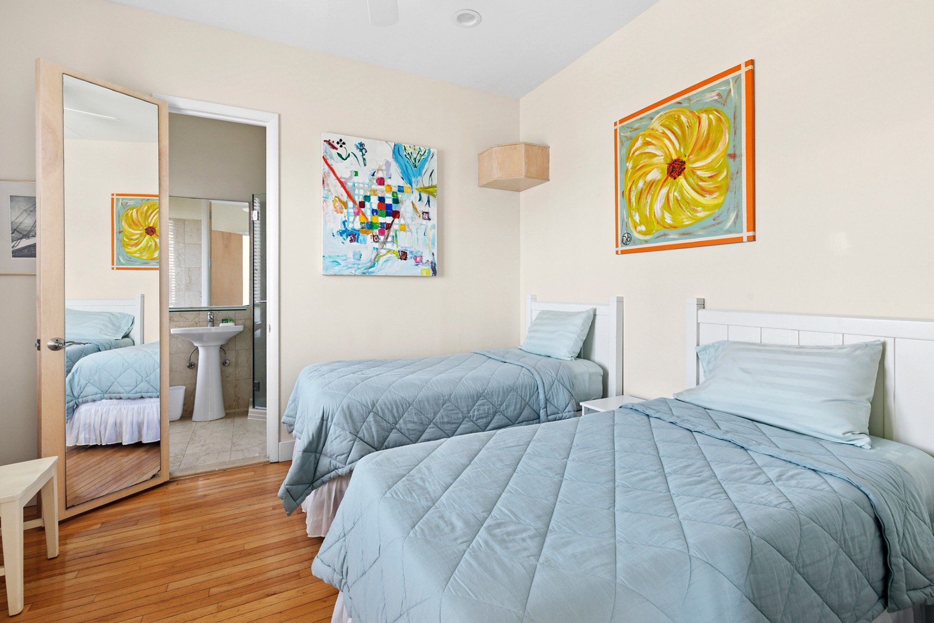 819 Dune Road Westhampton Beach, NY 11978 - Photo 10 of 18 a bedroom with a bed and painting on the wall