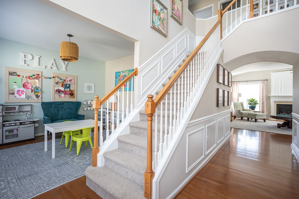 8206 Marvino Lane Raleigh, NC 27613 - Photo 11 of 30 A grand entry into your new home! Hardwoods are continuous through the main level. Allow your gaze to move smoothly from room to room. Foyer