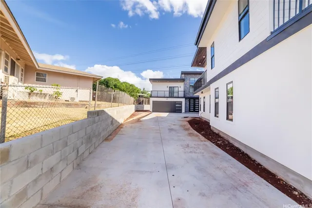 a house with yard and parking space