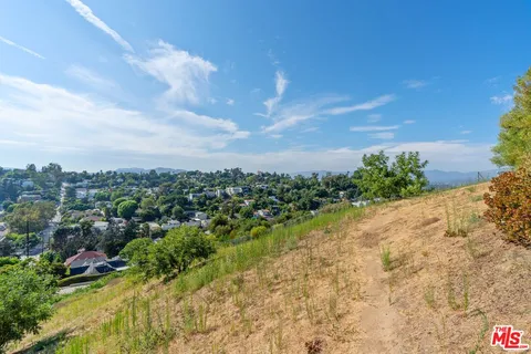 a view of a lake with a city