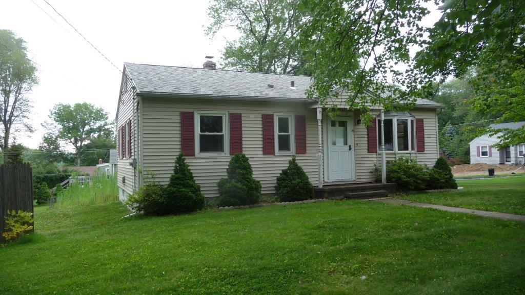 84 Chasse Road Wolcott, CT 06716 - Photo 1 of 1 a view of a house with a yard and plants