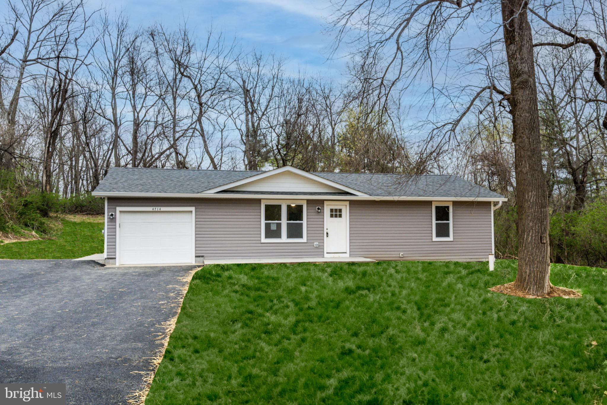 4714 Ladiesburg Road Union Bridge, MD 21791 - Photo 1 of 34 a front view of a house with yard and green space