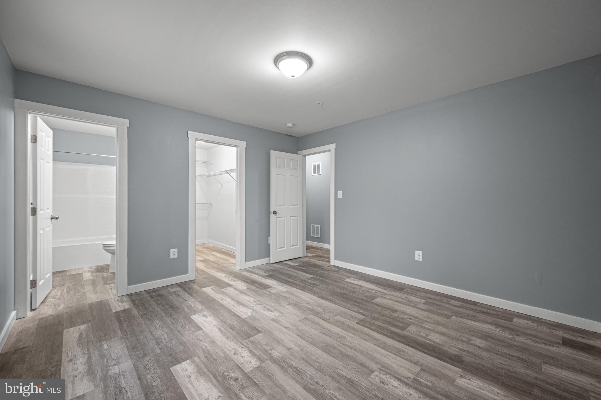 4714 Ladiesburg Road Union Bridge, MD 21791 - Photo 23 of 34 a view of an empty room and wooden floor