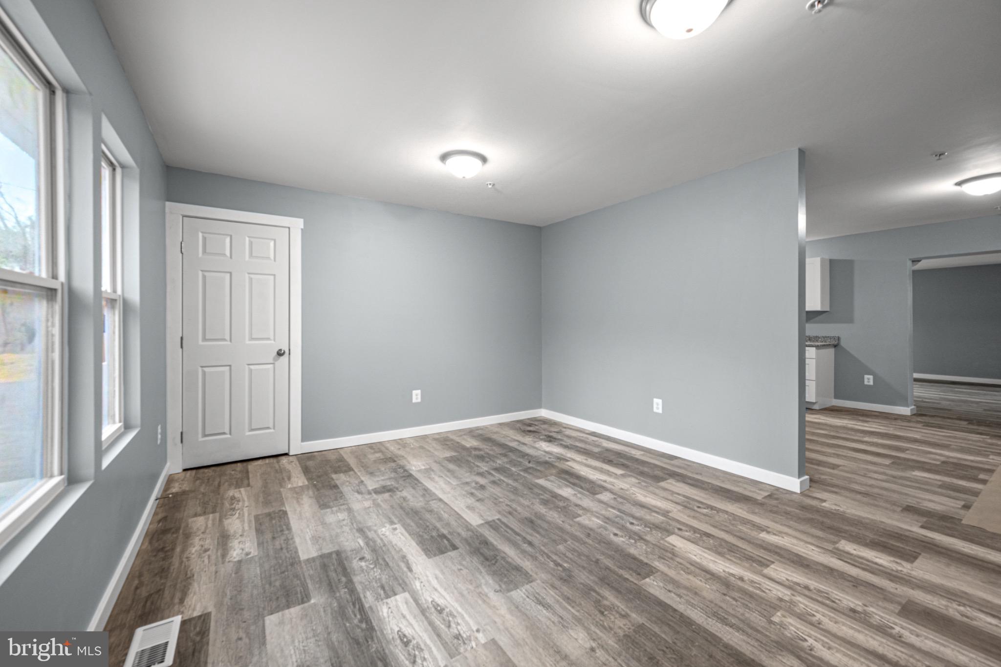 4714 Ladiesburg Road Union Bridge, MD 21791 - Photo 7 of 34 wooden floor in an empty room with a window