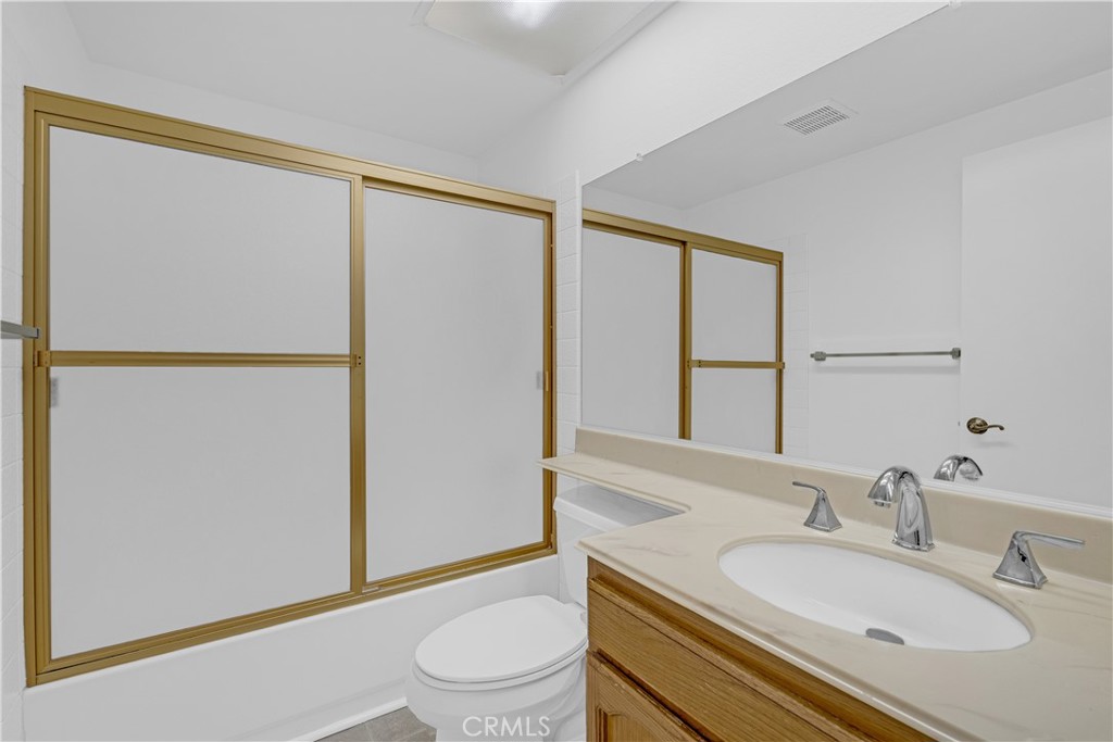 19451 Eagle Ridge Lane Porter Ranch, CA 91326 - Photo 43 of 59 a bathroom with a sink toilet and shower