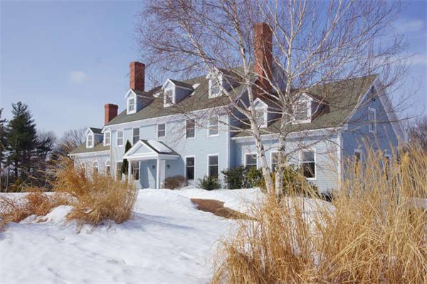 231 Old Littleton Road Harvard, MA 01451 - Photo 1 of 30 a view of a building with a snow